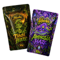 Thai Haze og Amnesia Haze 20g THCA bundle med to haze-topskud på sort baggrund